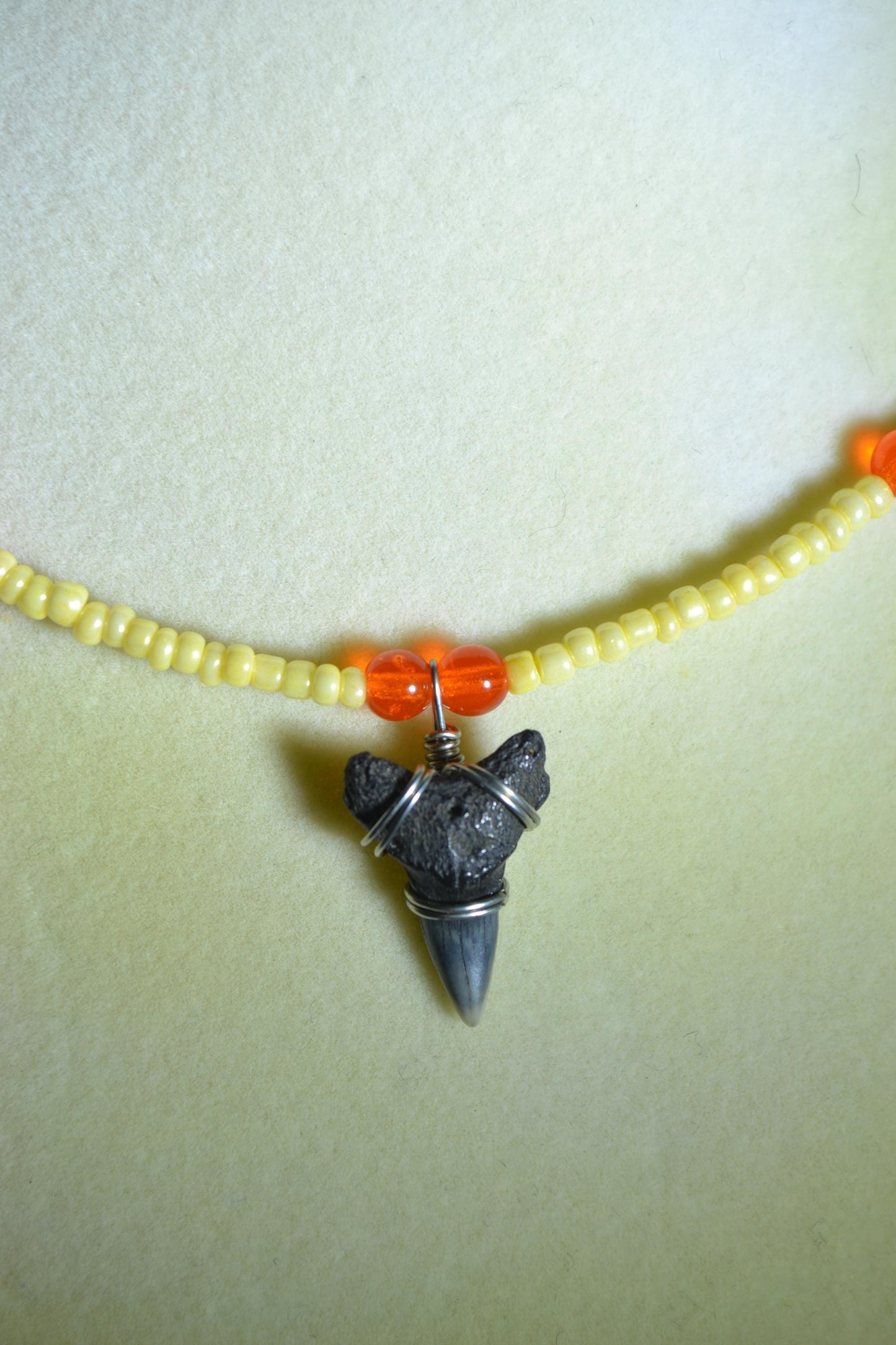 Wire wrapped sharks tooth beaded choker. Yellow and orange