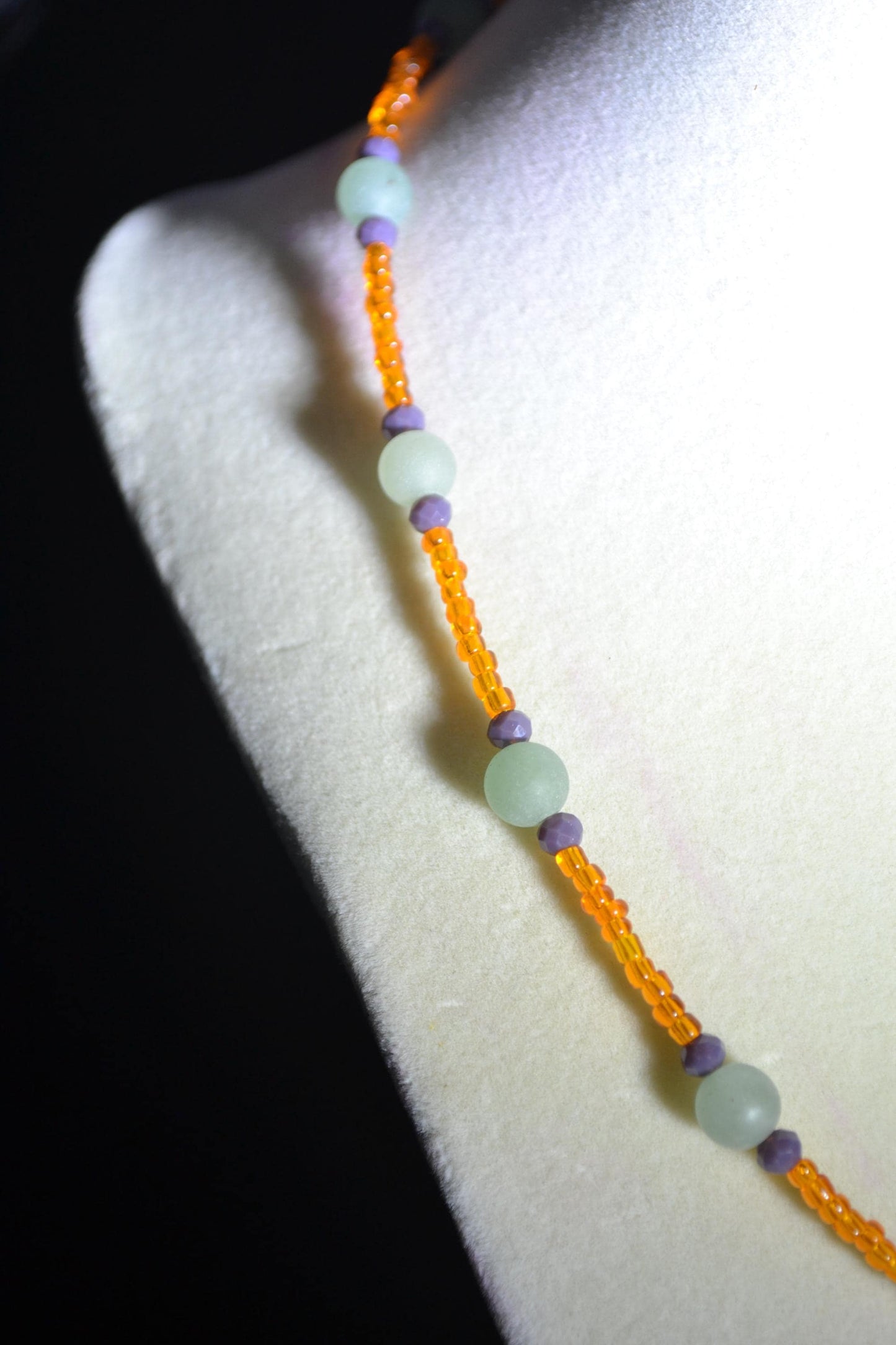Multicolor glass bead necklace. Orange, grey, and green