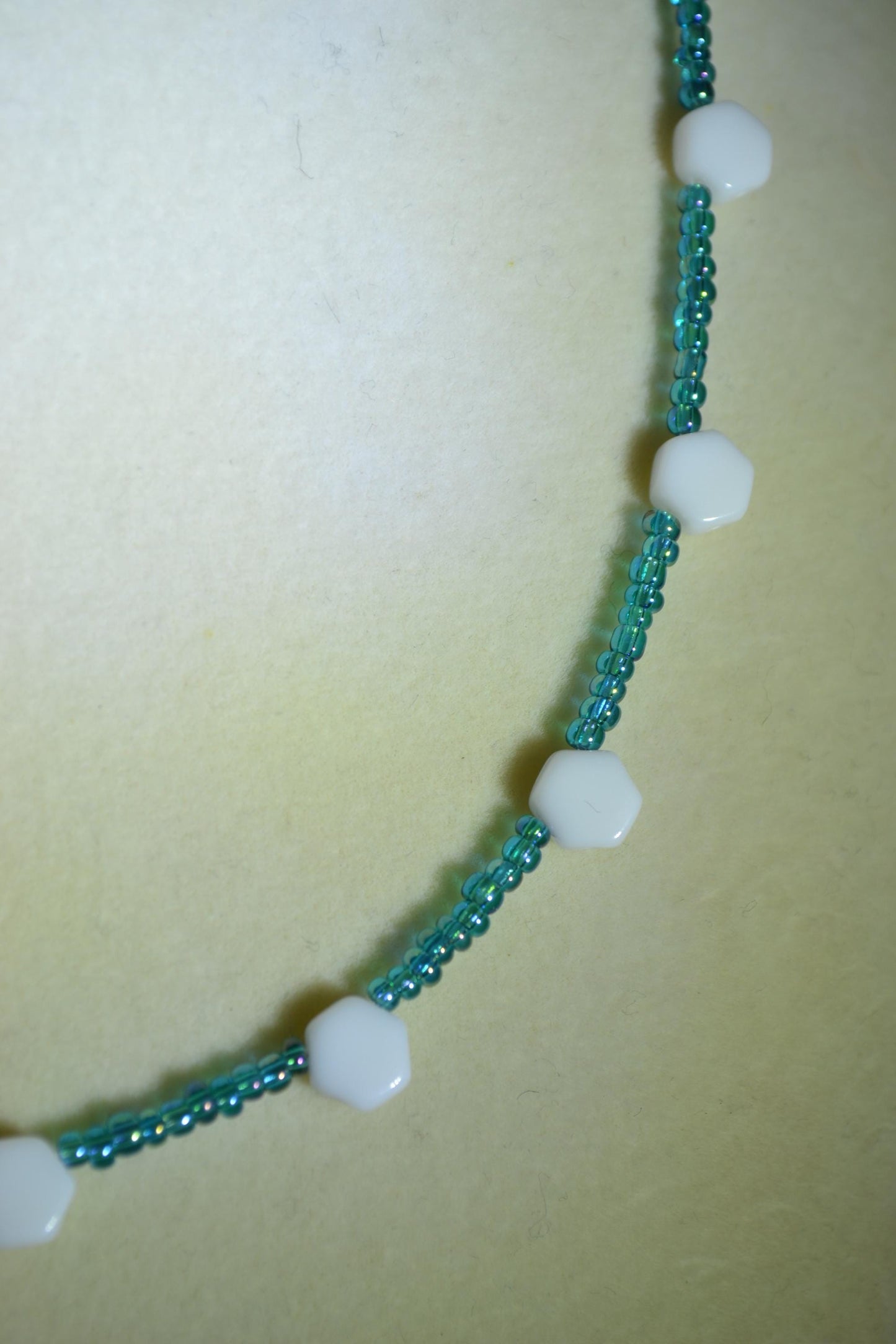 Multicolor glass bead necklace. Blue and iridescent white. Reversible