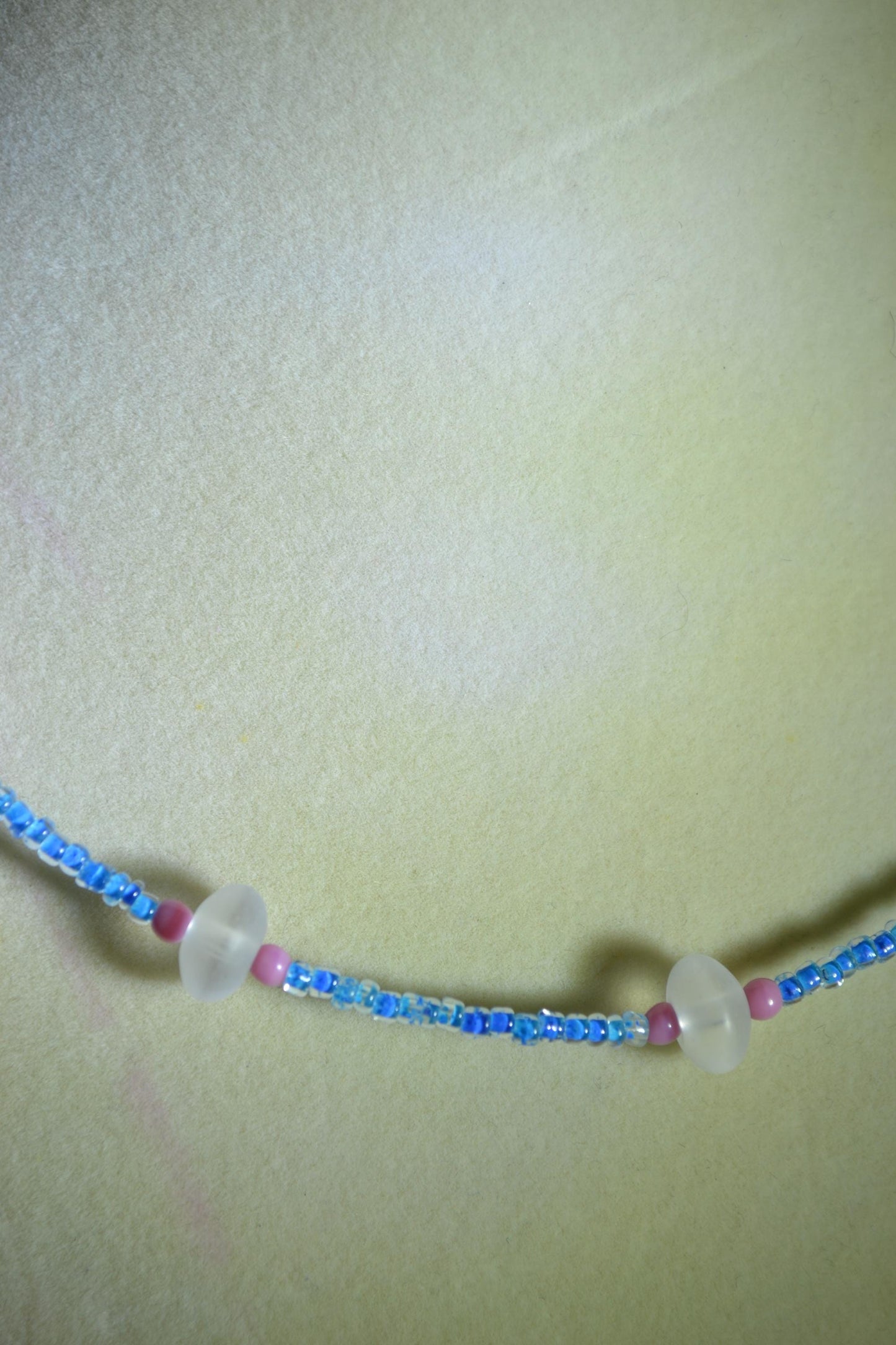 Multicolor glass bead necklace. Blue, clear, and pink