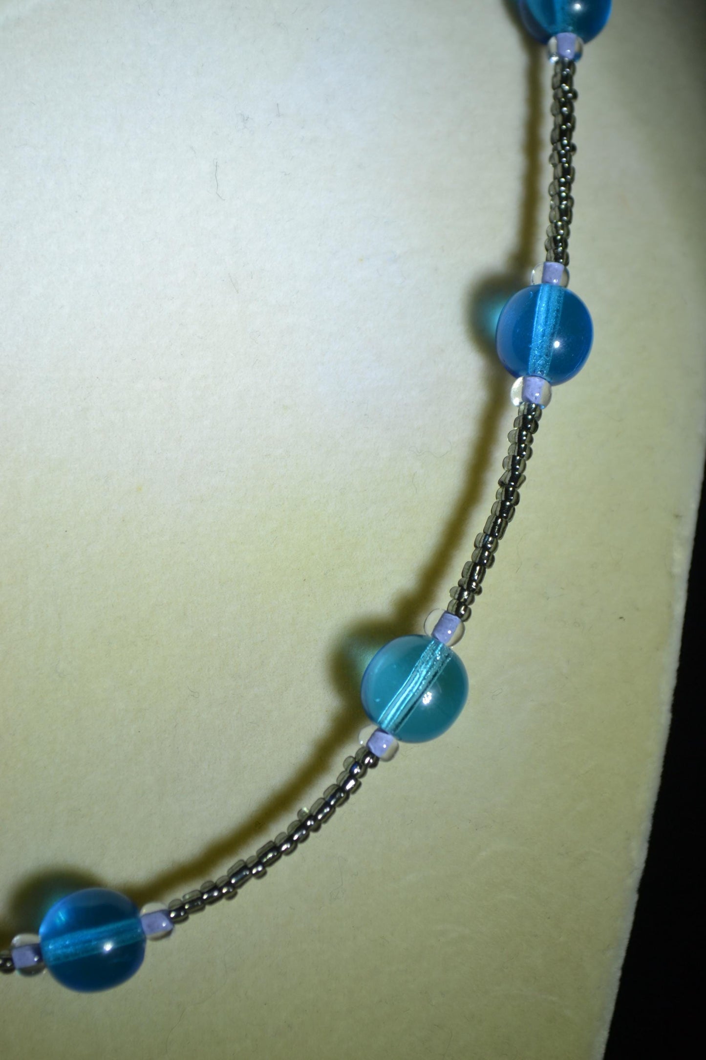 Multicolor glass bead necklace. Blues and black