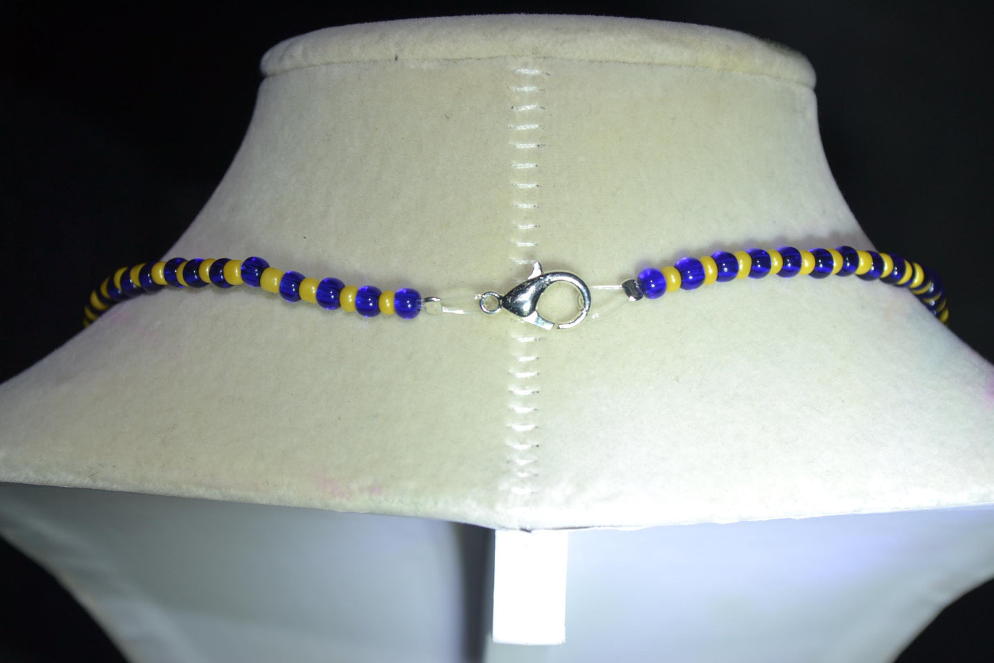 Seahorse pendant glass bead necklace. Blue and yellow