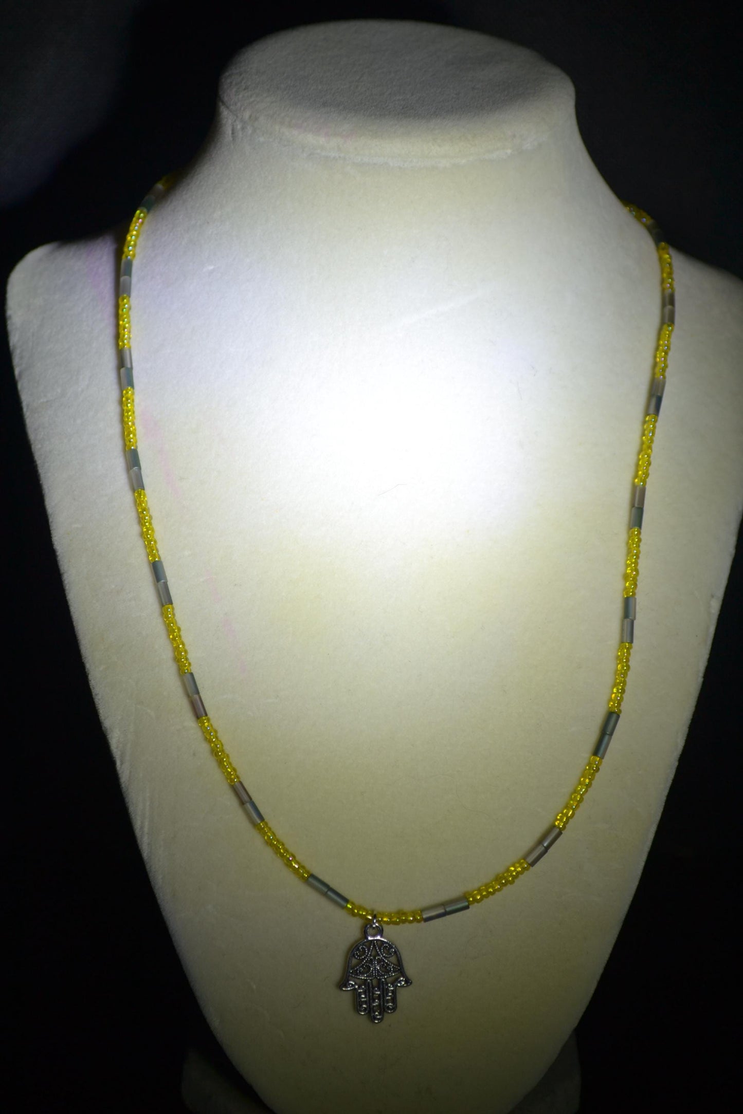 Hamsa pendant glass bead necklace. Yellow and silver
