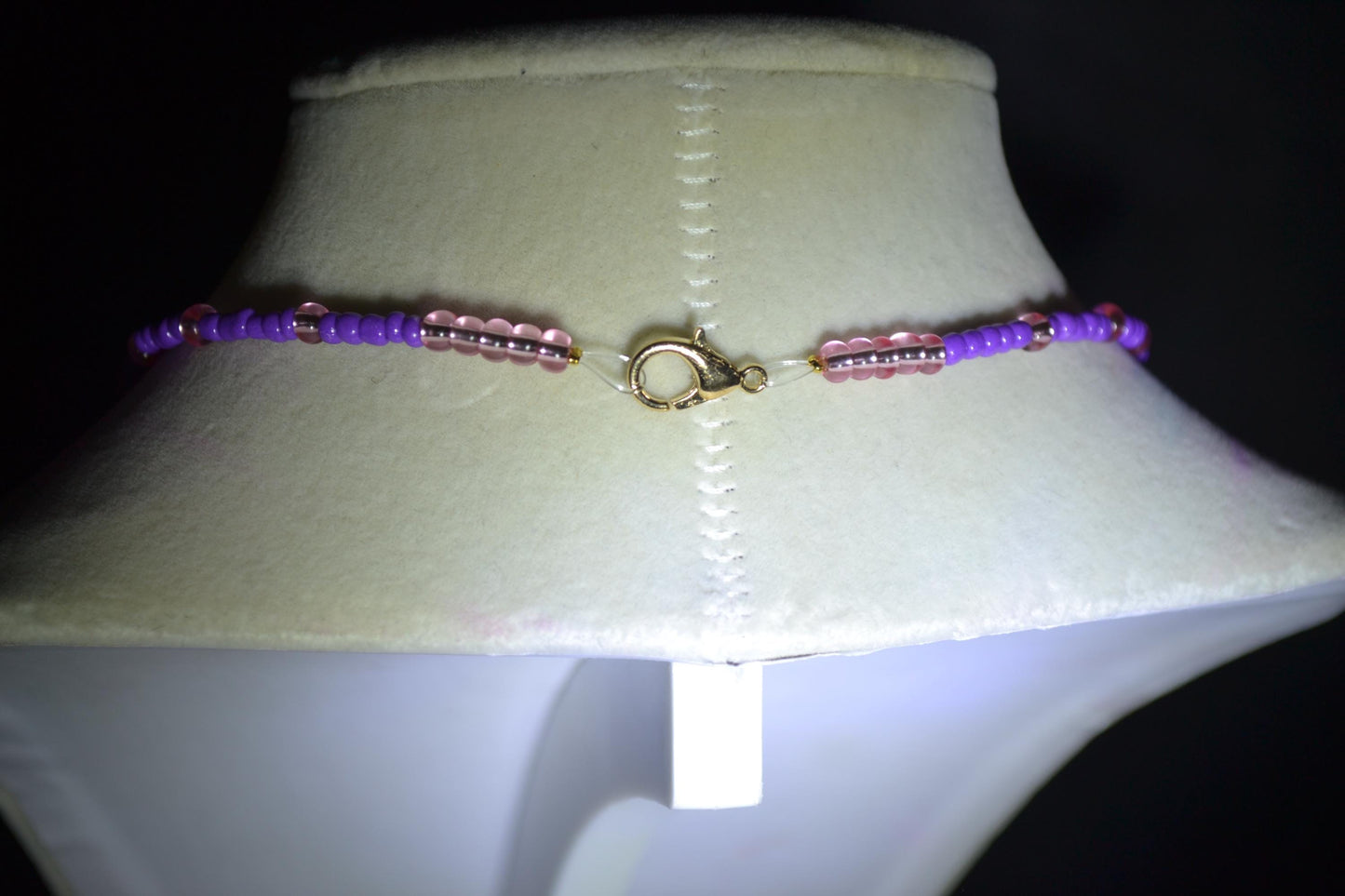 Wire wrapped sharks tooth beaded necklace. Purple and pink
