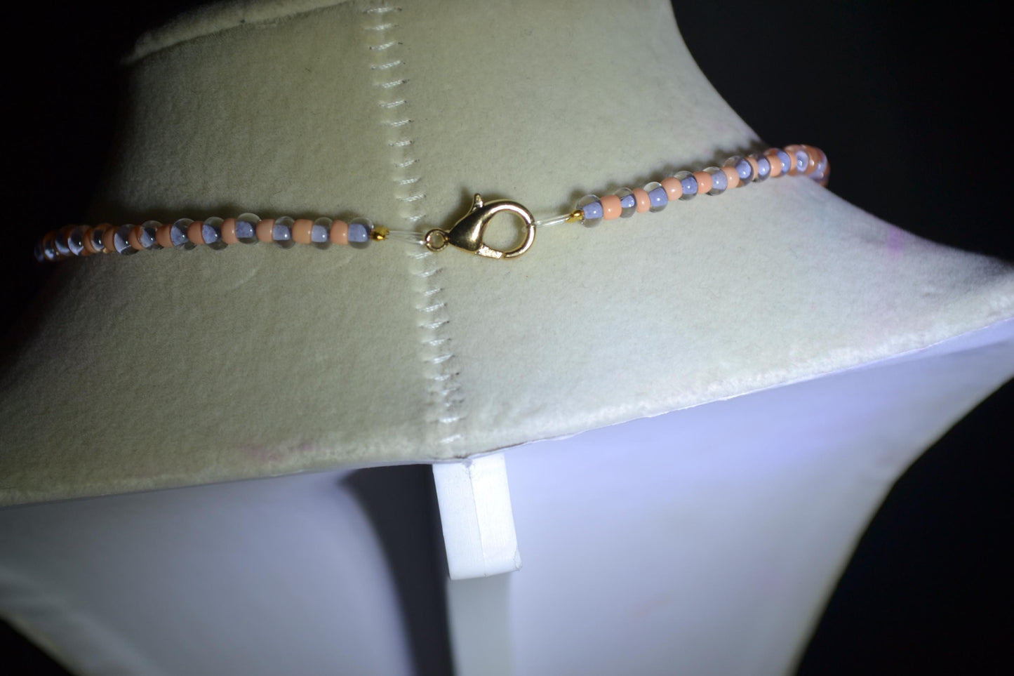 White seahorse pendant glass bead necklace. Peach and lavender