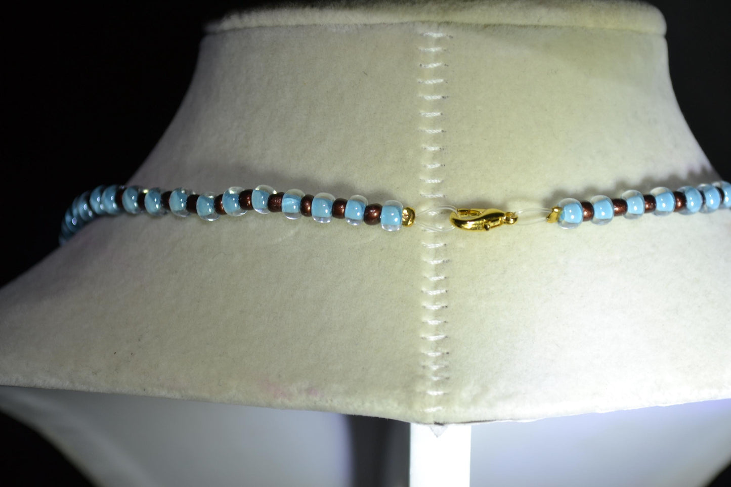 Anchor pendant glass bead necklace. Blue and brown