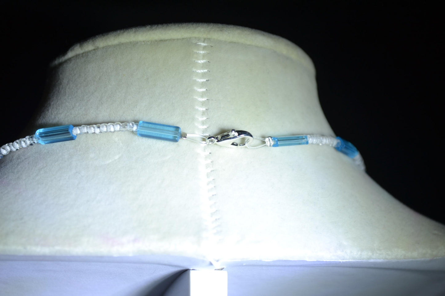 Manatee pendant glass bead necklace. Blue and white