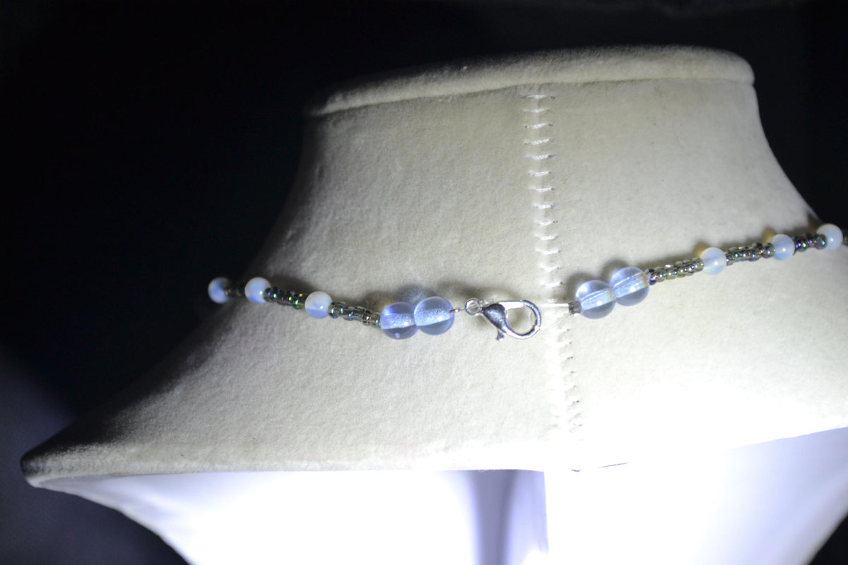 Palm tree pendant glass bead necklace. Oil spill and moonstone