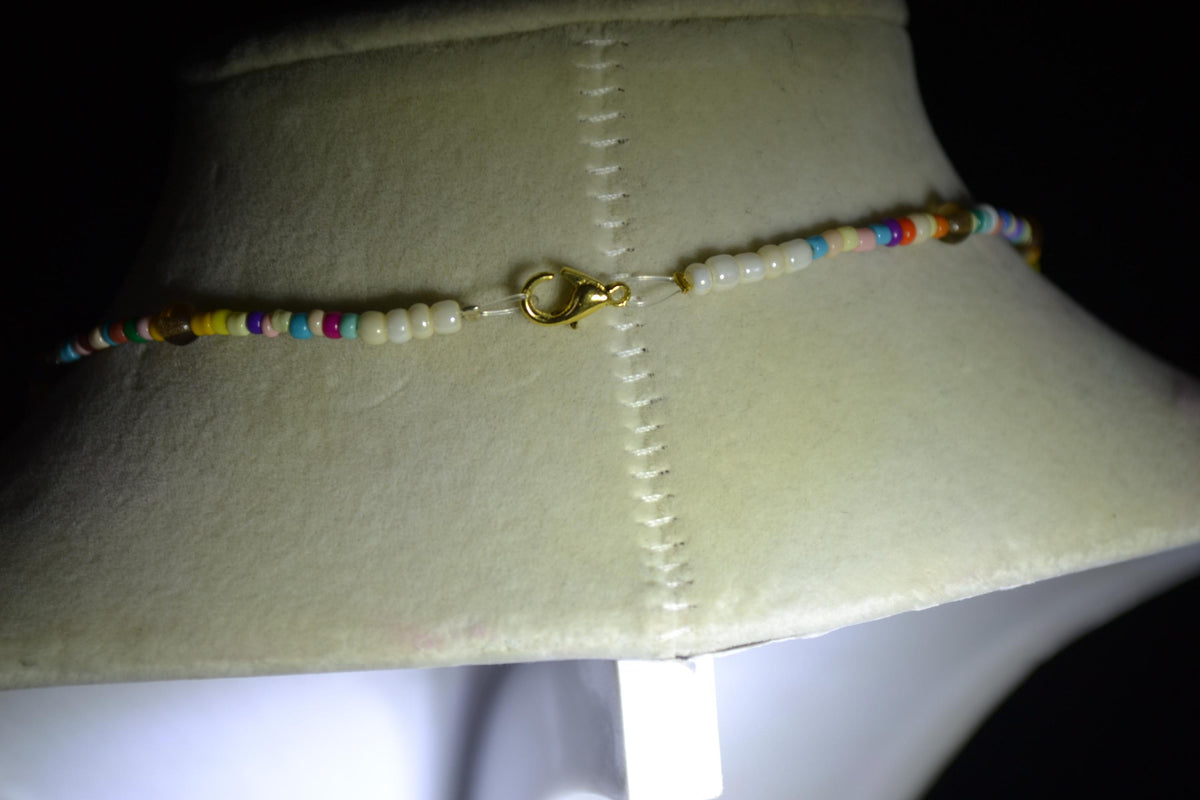 Gold Scissor pendant glass bead necklace. Rainbow and natural