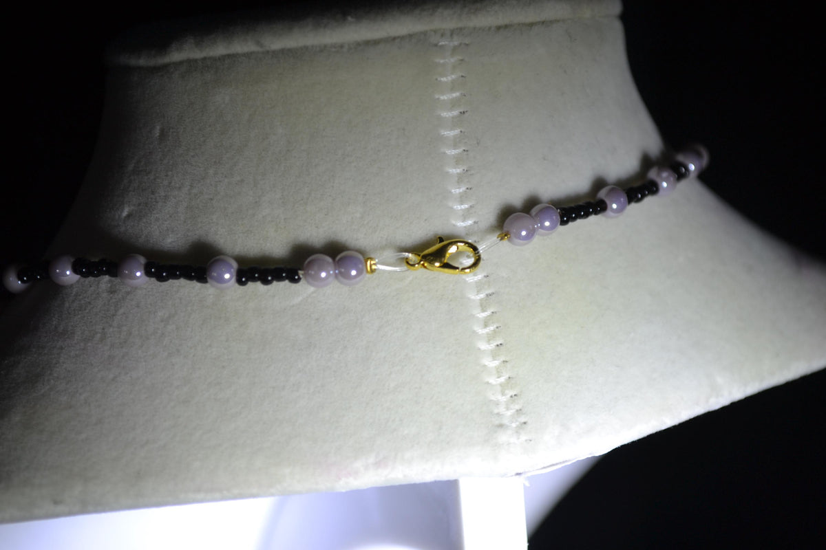 Butterfly pendant glass bead necklace. Purple and black