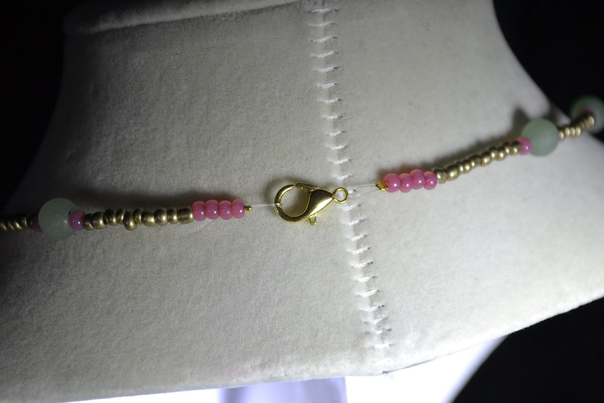 Multicolor glass bead necklace. Gold, sea glass, and raspberry