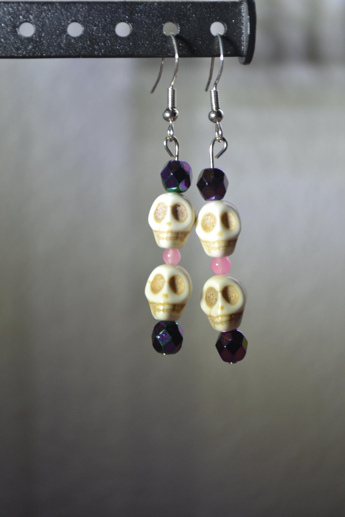 Beaded Skull Earrings. Metallic purple and pink