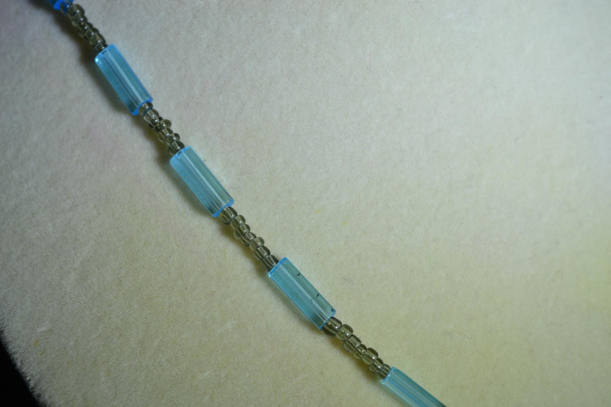 Silver crab pendant glass bead necklace. Blue and gray