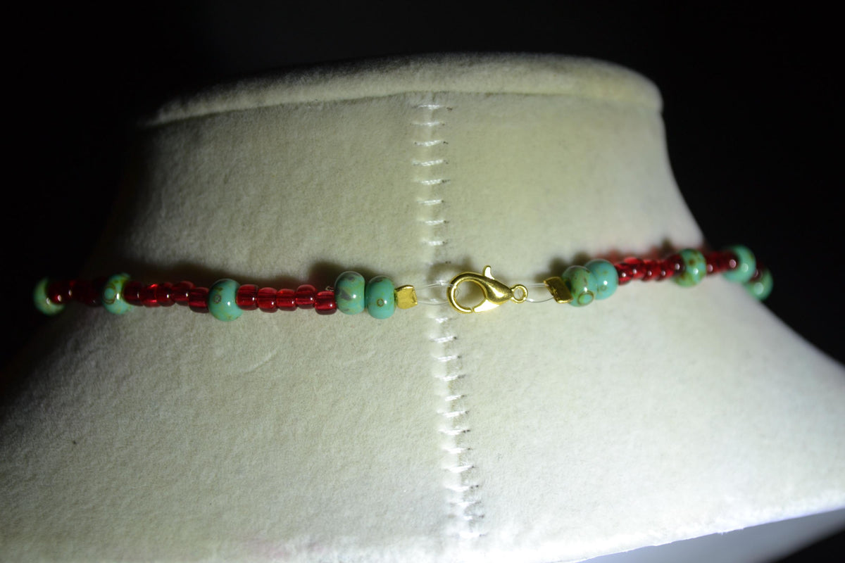 Gold fairy pendant glass bead choker. Red & Picasso turquoise