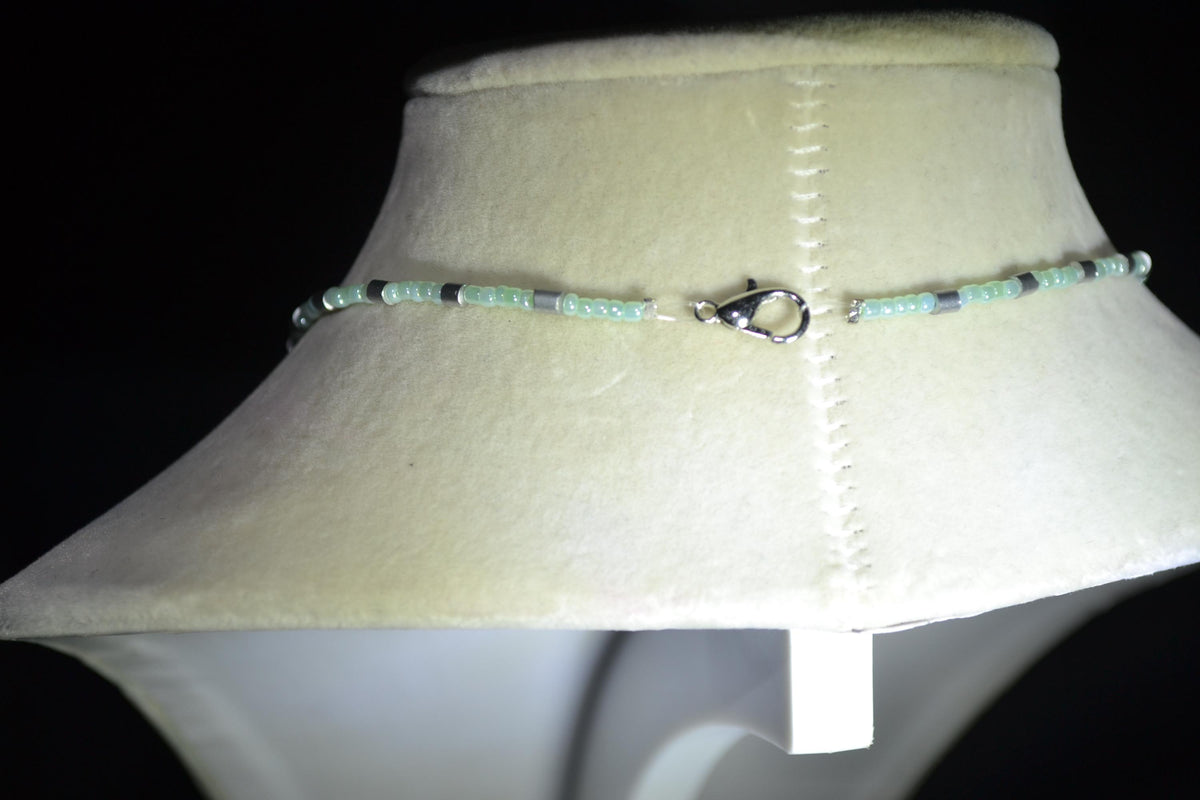 Silver Cactus pendant glass bead necklace. Pearl green and silver
