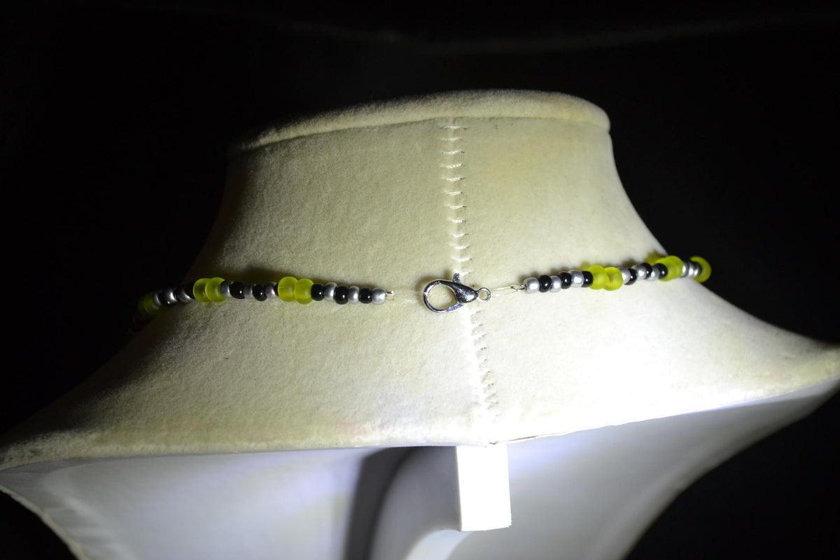 Silver gecko pendant glass bead necklace. Black, silver, and frosted green