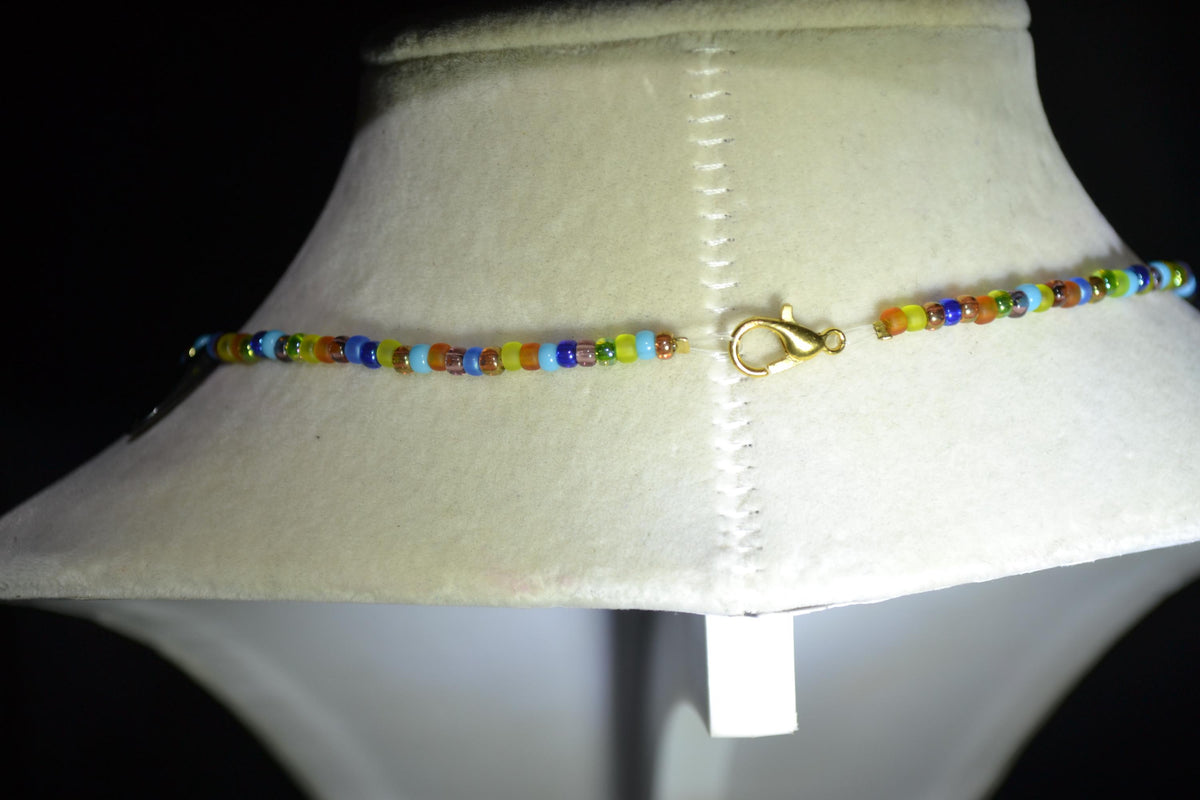Multicolor glass bead choker. Black daggers and stained glass