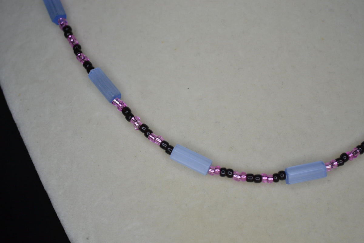 Multicolor glass bead necklace. Blue cat eye, pink, and black