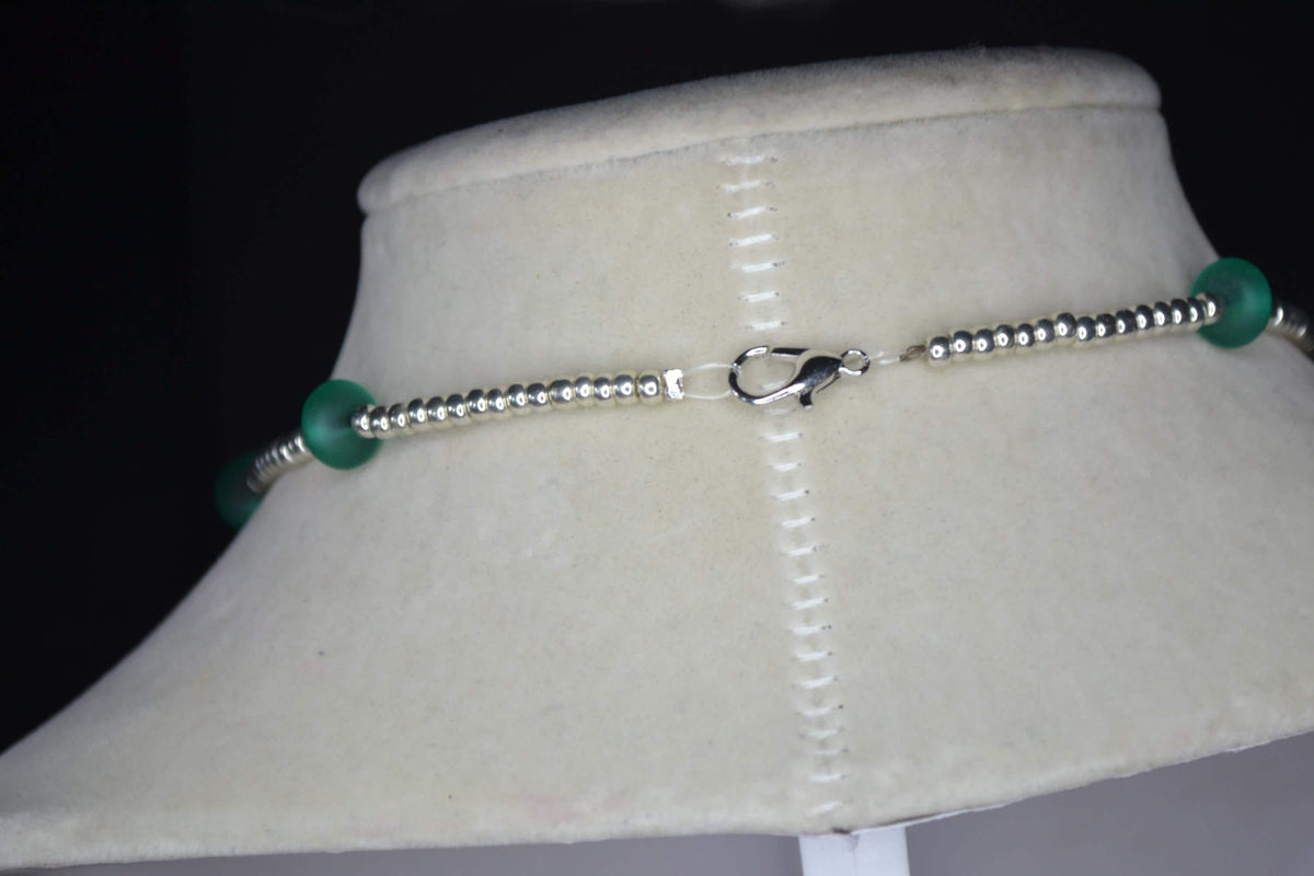 Silver starfish pendant glass bead necklace. Teal and silver