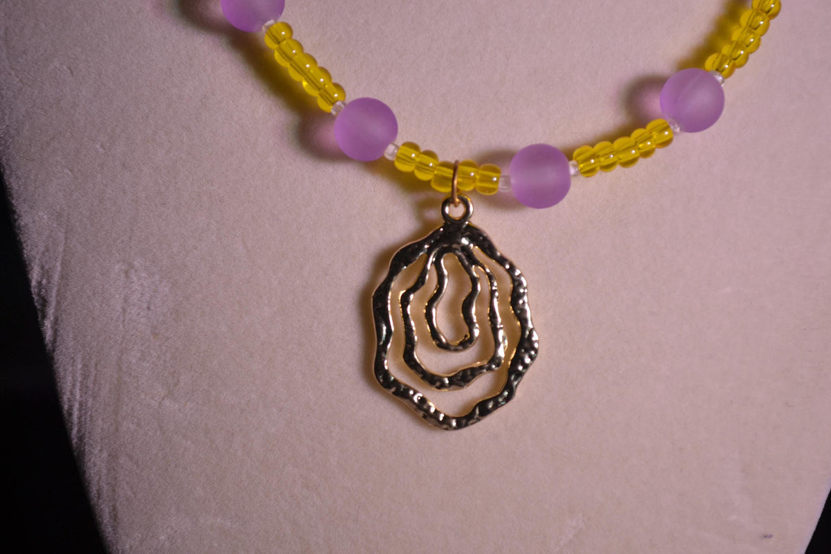Multicolor glass bead necklace. Purple and Yellow