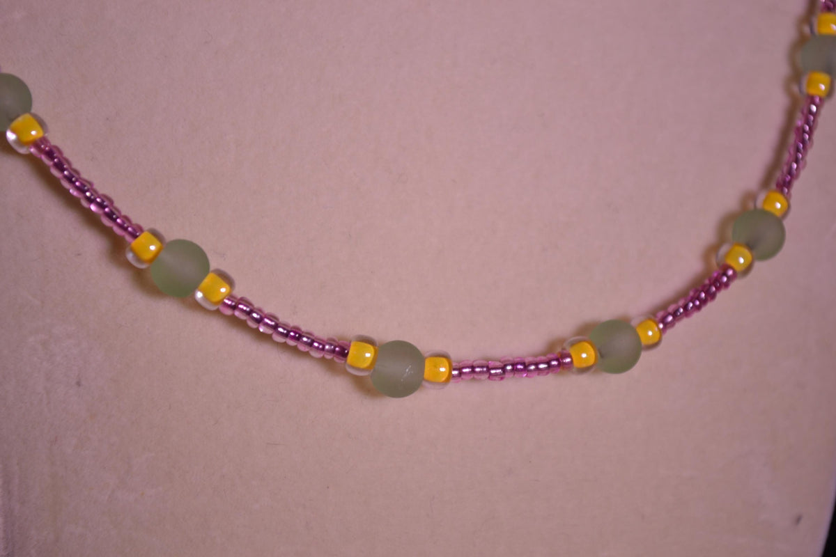 Glass bead necklace. Pink, yellow, and green.