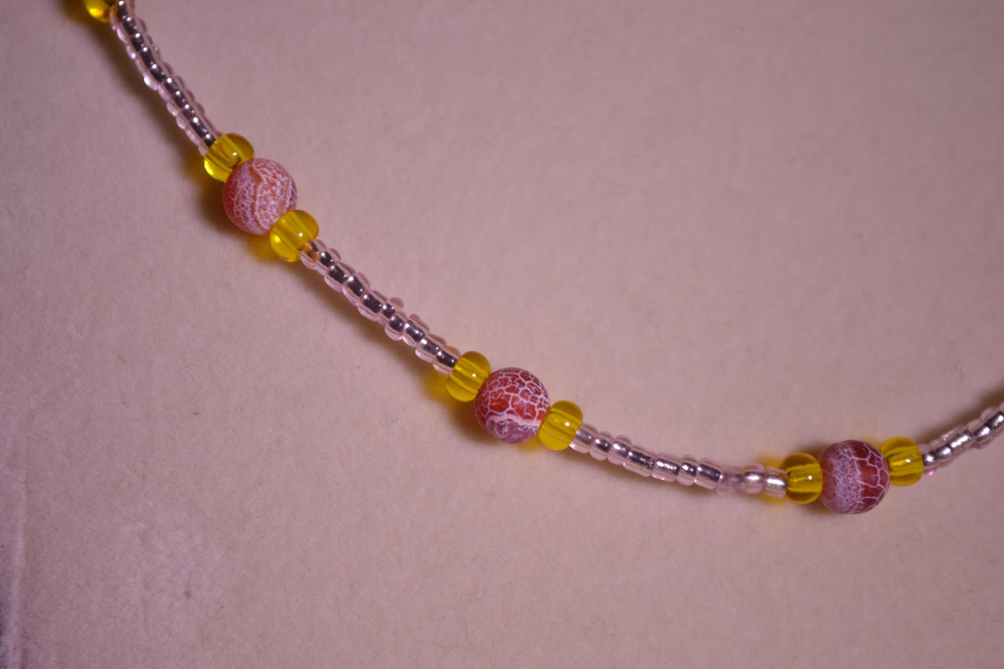 Multicolor glass bead necklace. Crackled red, yellow, and rose