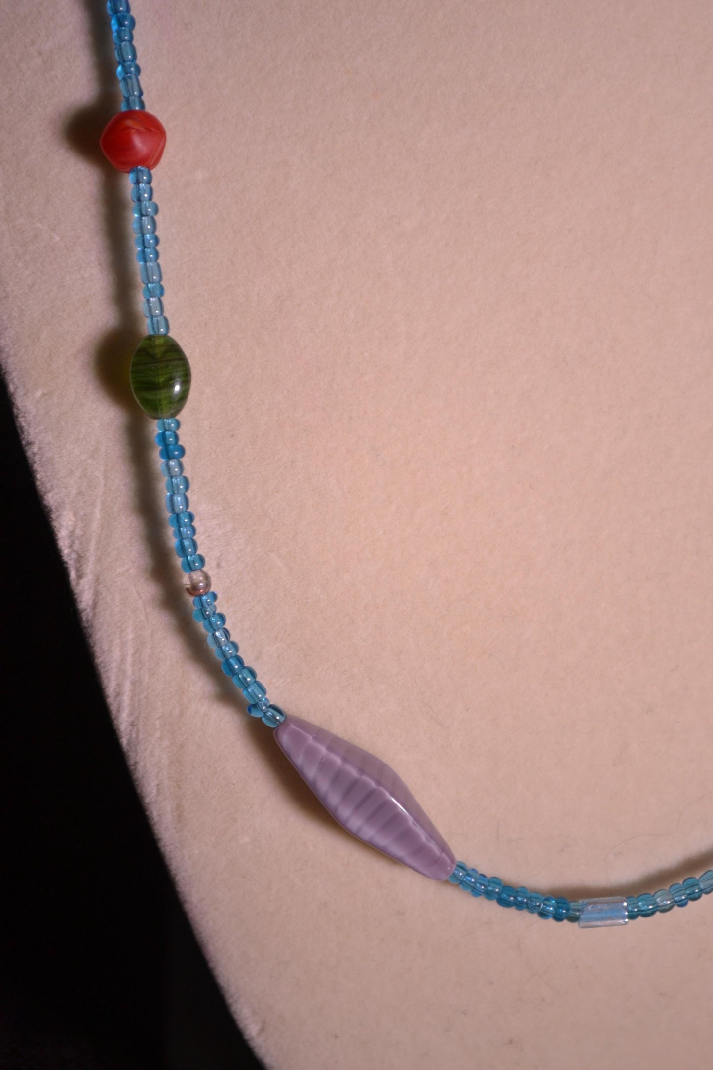 Multicolor glass bead necklace. Blue and randomized