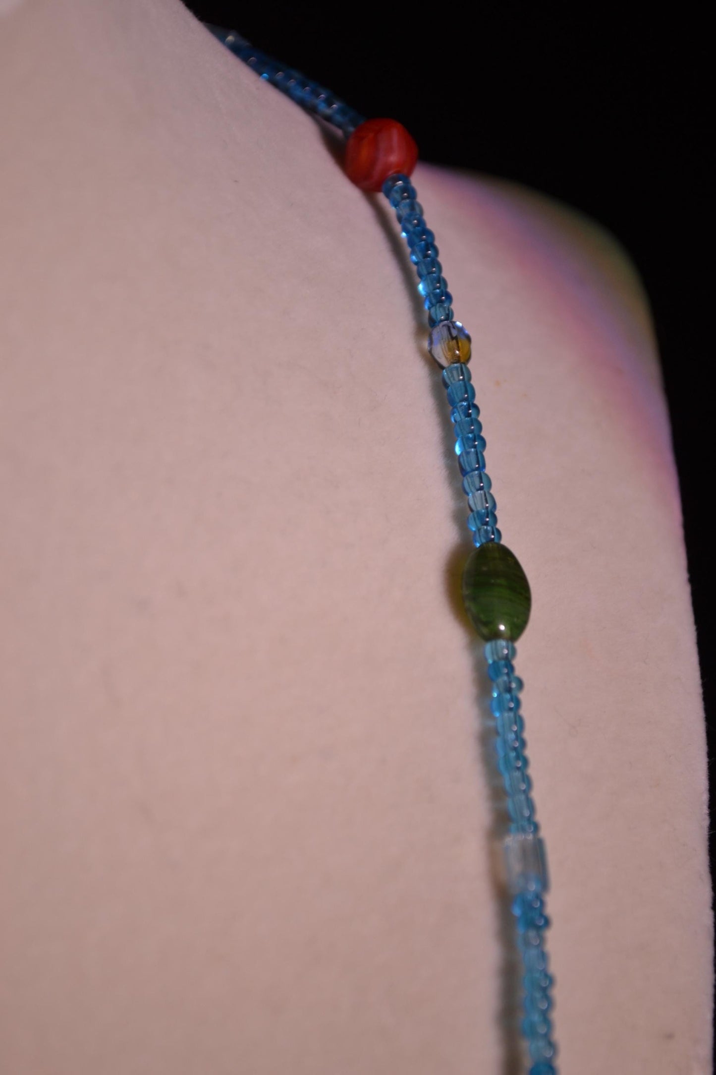 Multicolor glass bead necklace. Blue and randomized