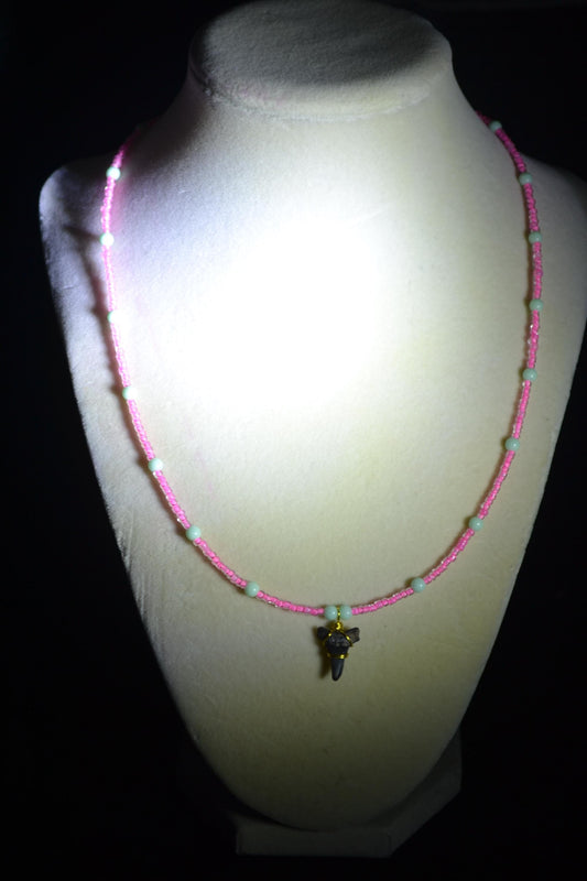 Wire wrapped sharks tooth pendant beaded necklace. Pink and green