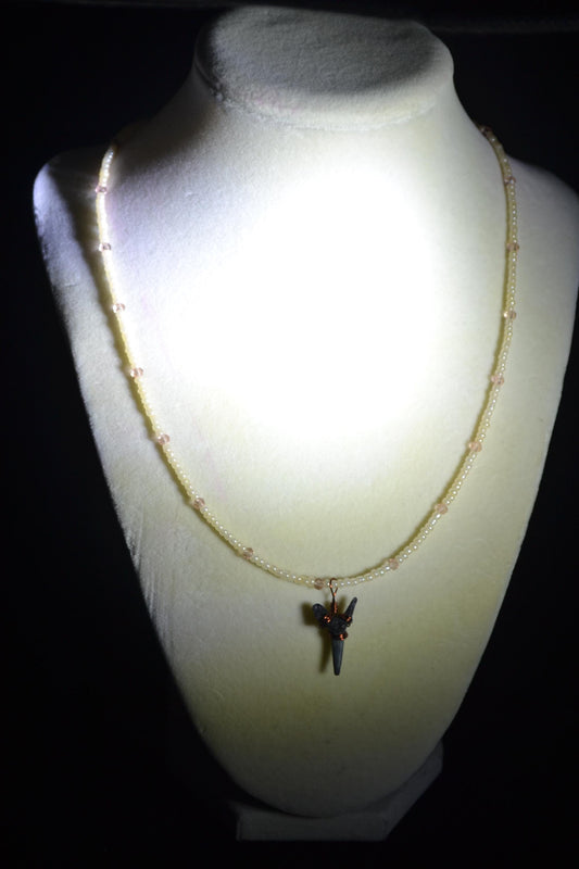 Wire wrapped sharks tooth beaded necklace. Pearl and peach