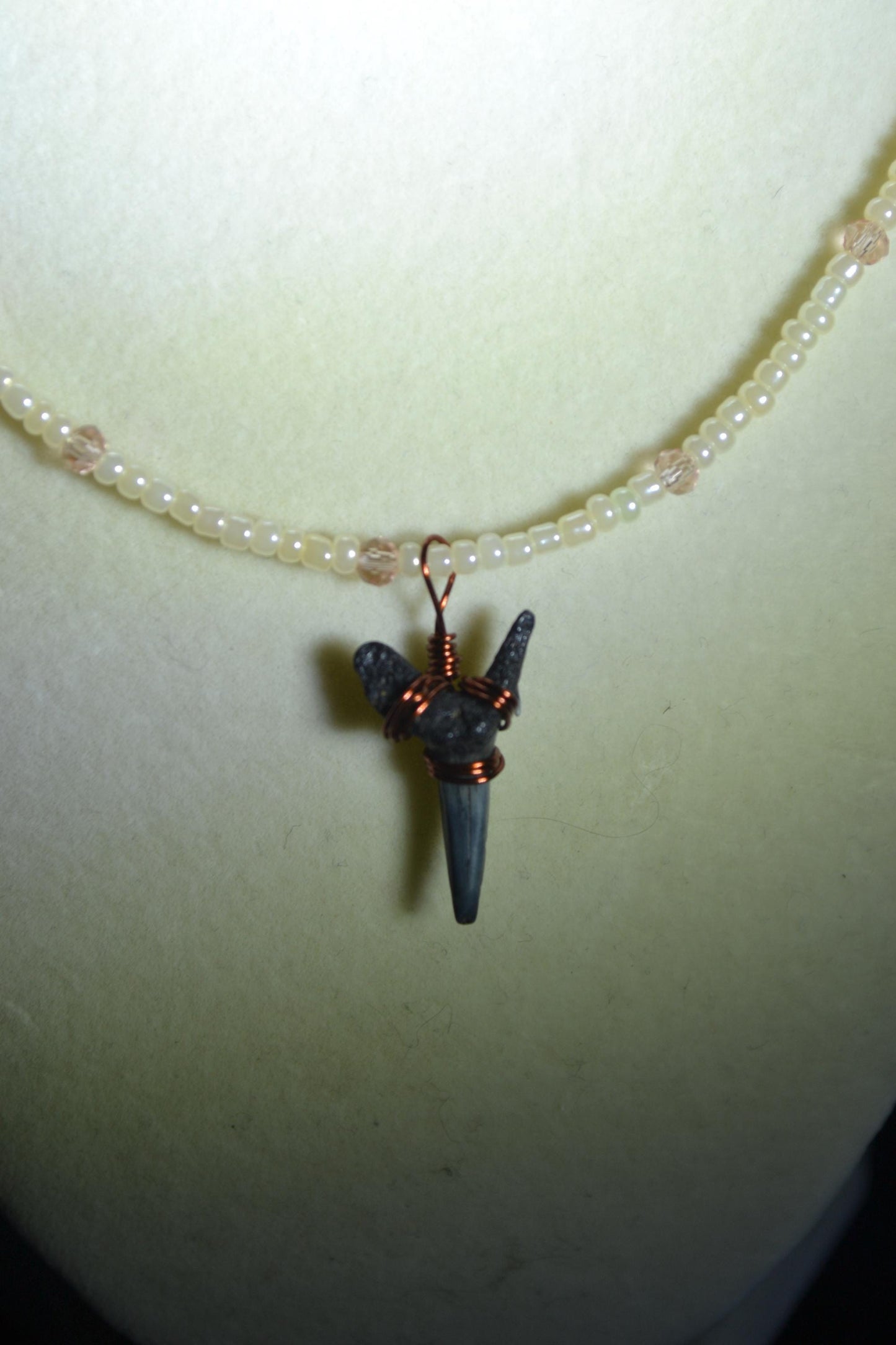 Wire wrapped sharks tooth beaded necklace. Pearl and peach