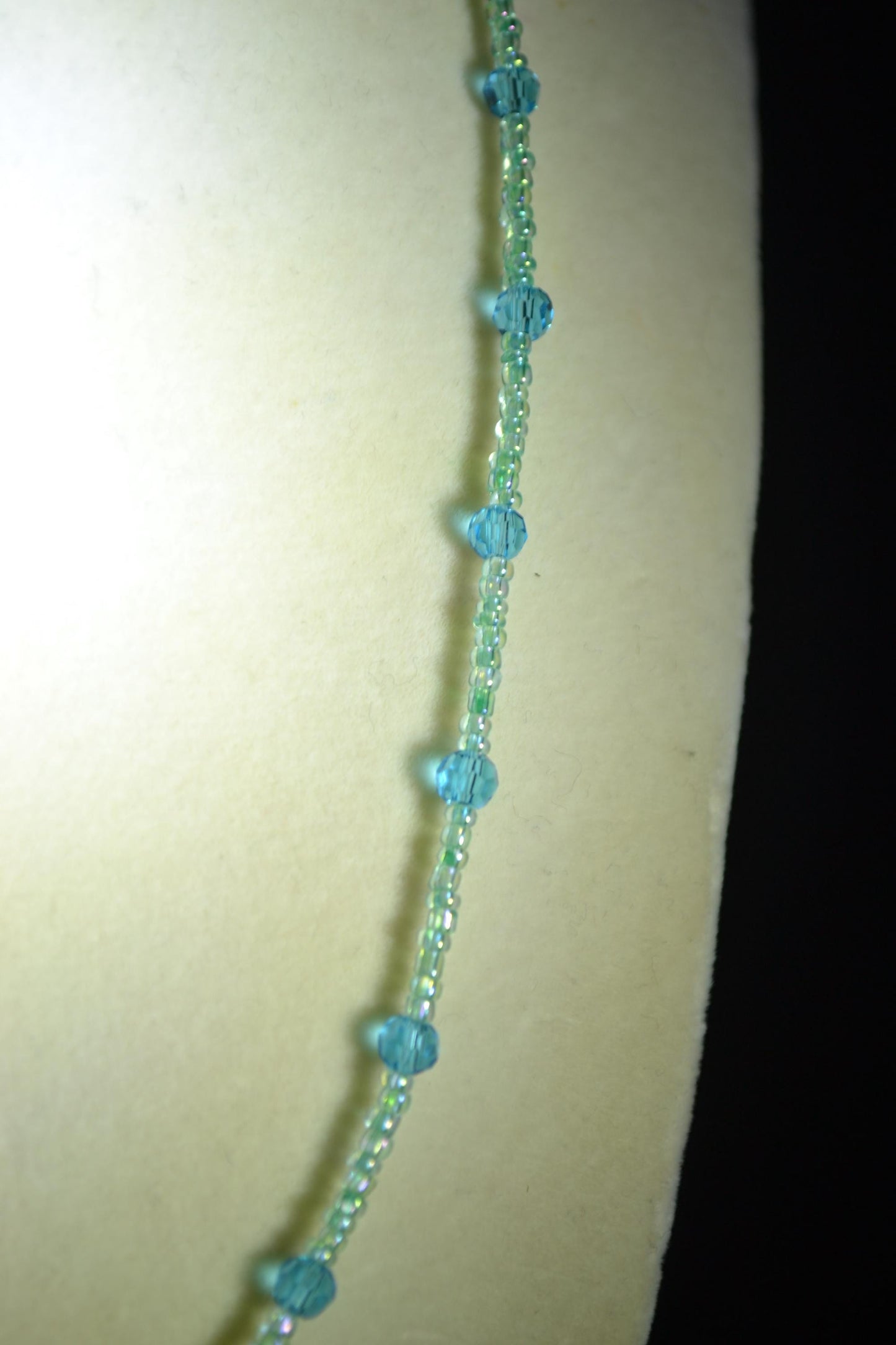 Wire wrapped sharks tooth beaded necklace. Blues