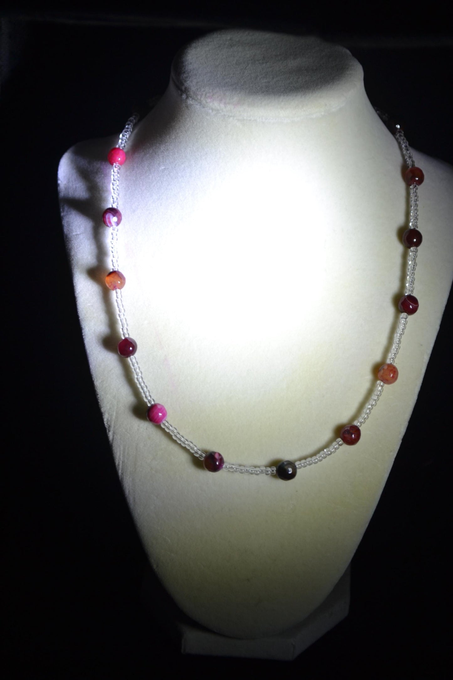 Multicolor glass bead necklace. Reds and crystal