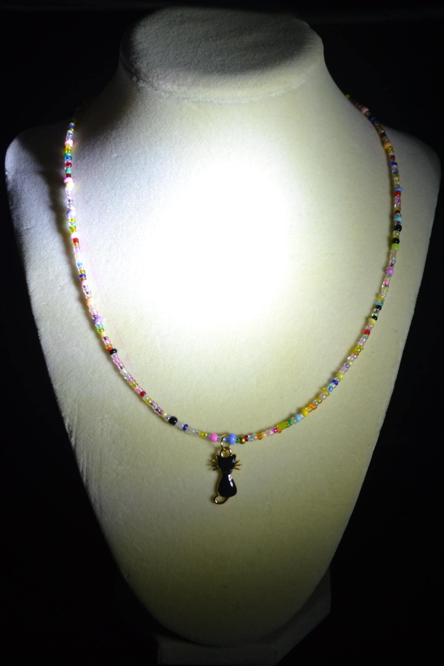 Multicolor glass bead necklace. Black cat pendant