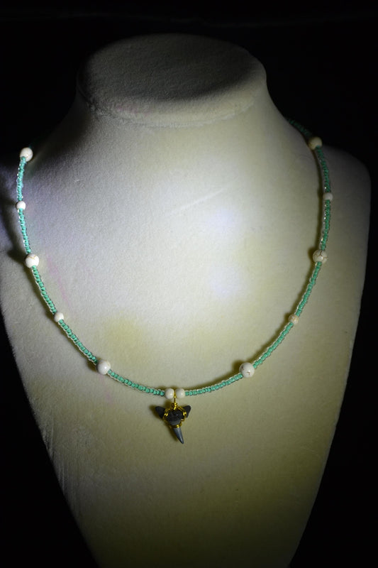 Wire wrapped sharks tooth beaded necklace. Teal and white