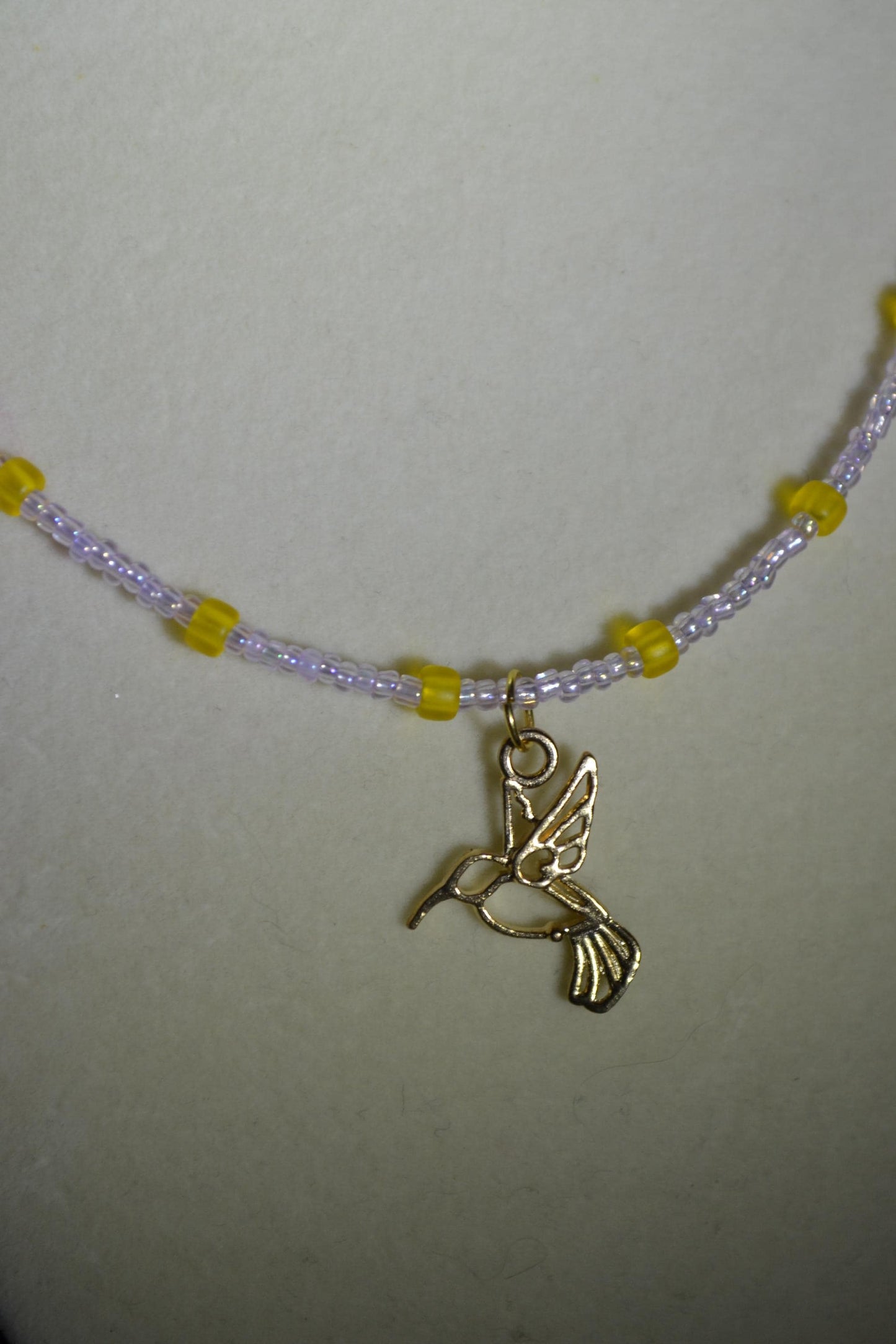 Hummingbird pendant glass bead necklace
