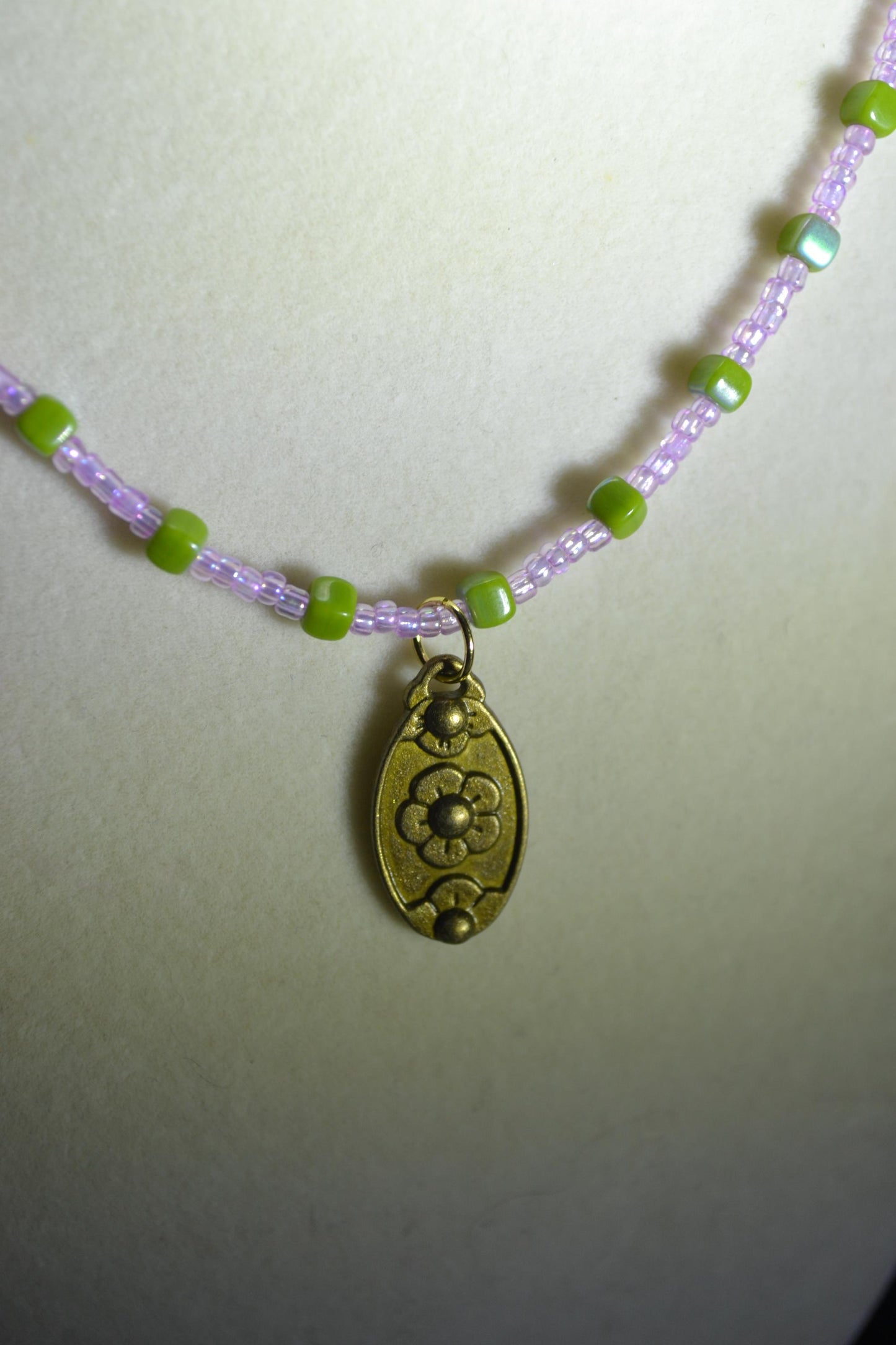 Brass flower pendant beaded necklace