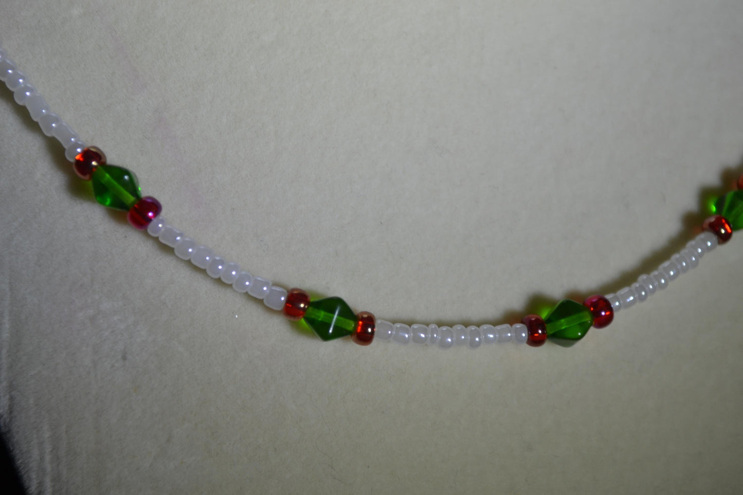 Multicolor glass bead necklace. Green, white, and red