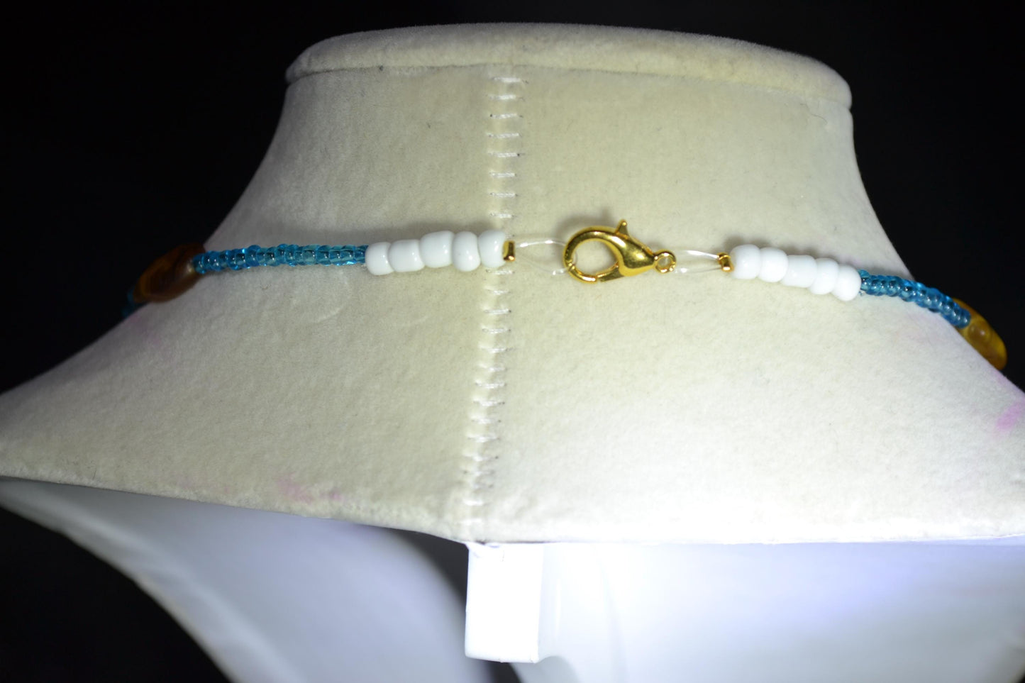 Beaded fish necklace. Blue and topaz