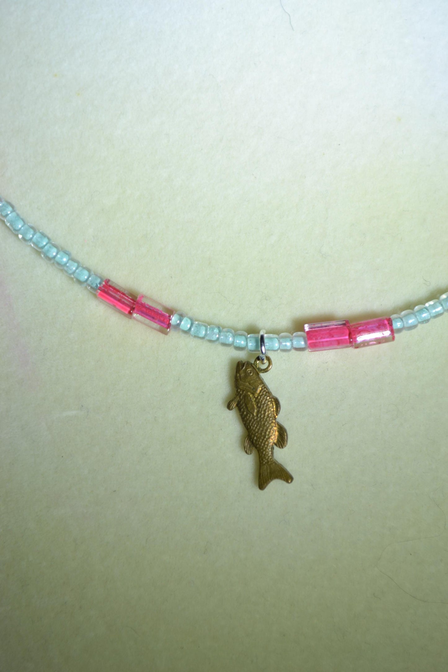 Brass fish pendant glass bead necklace
