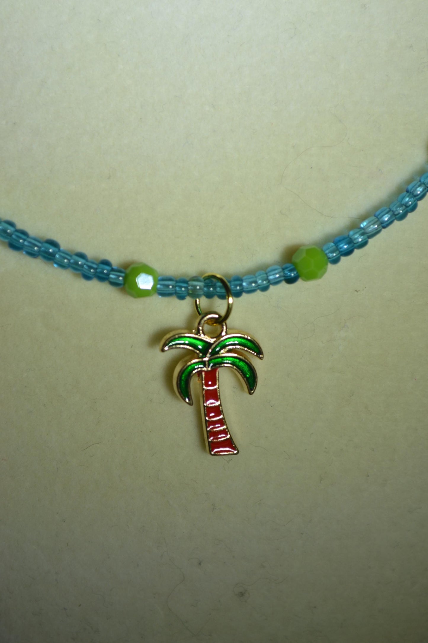 Palm tree pendant glass bead necklace