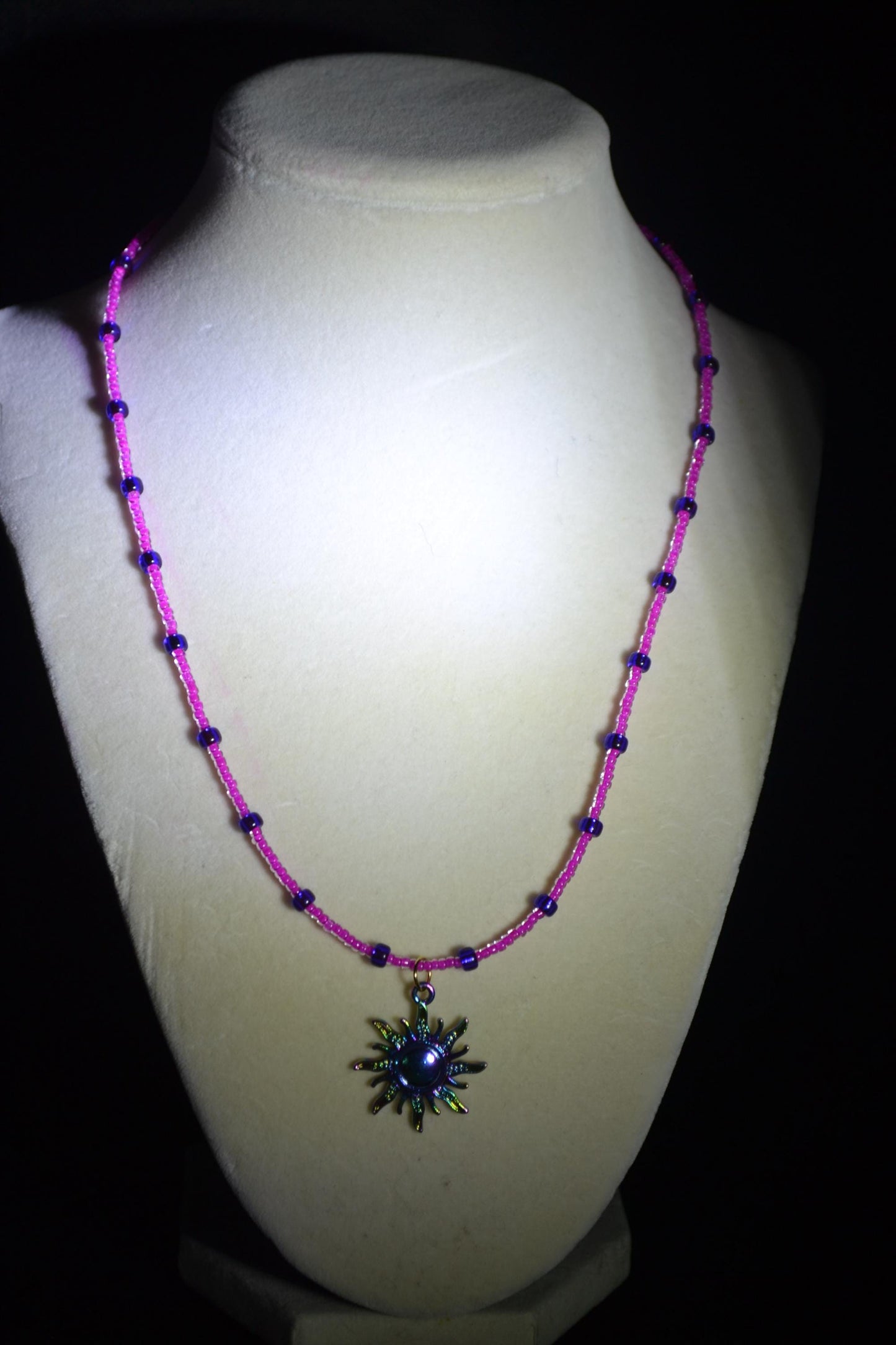 Rainbow sun pendant glass bead necklace. Pink and purple