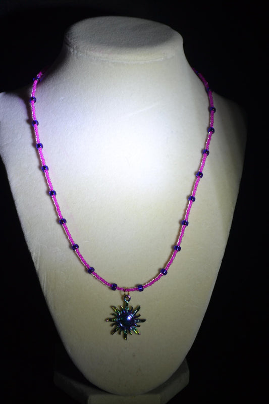 Rainbow sun pendant glass bead necklace. Pink and purple