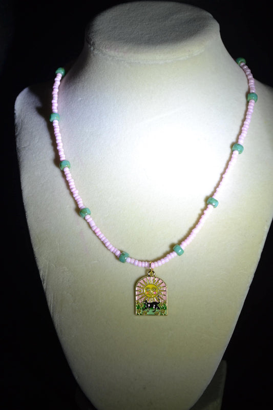Black cat with sun pendant glass bead necklace