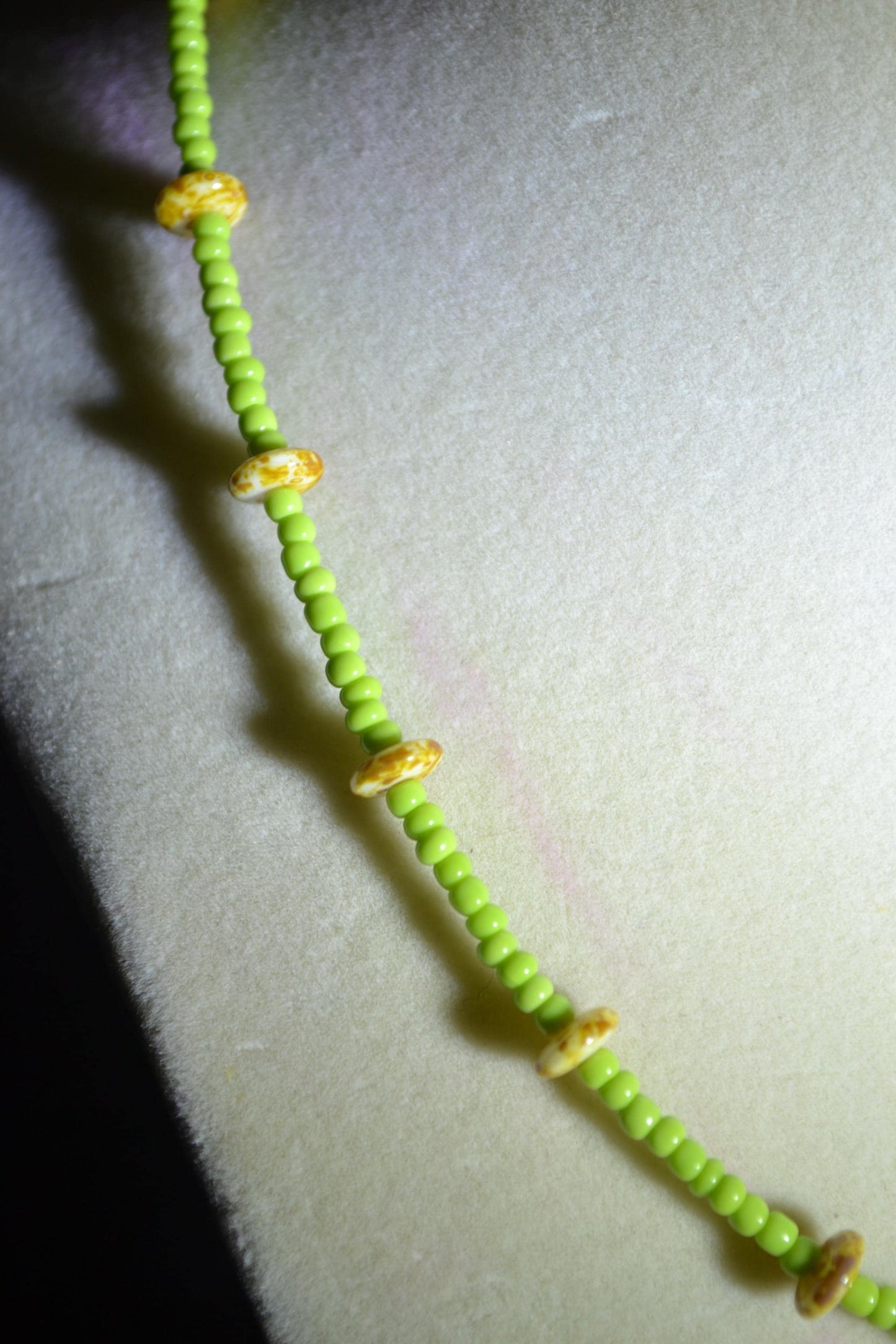 Multicolor glass bead necklace. Speckled yellow and lime