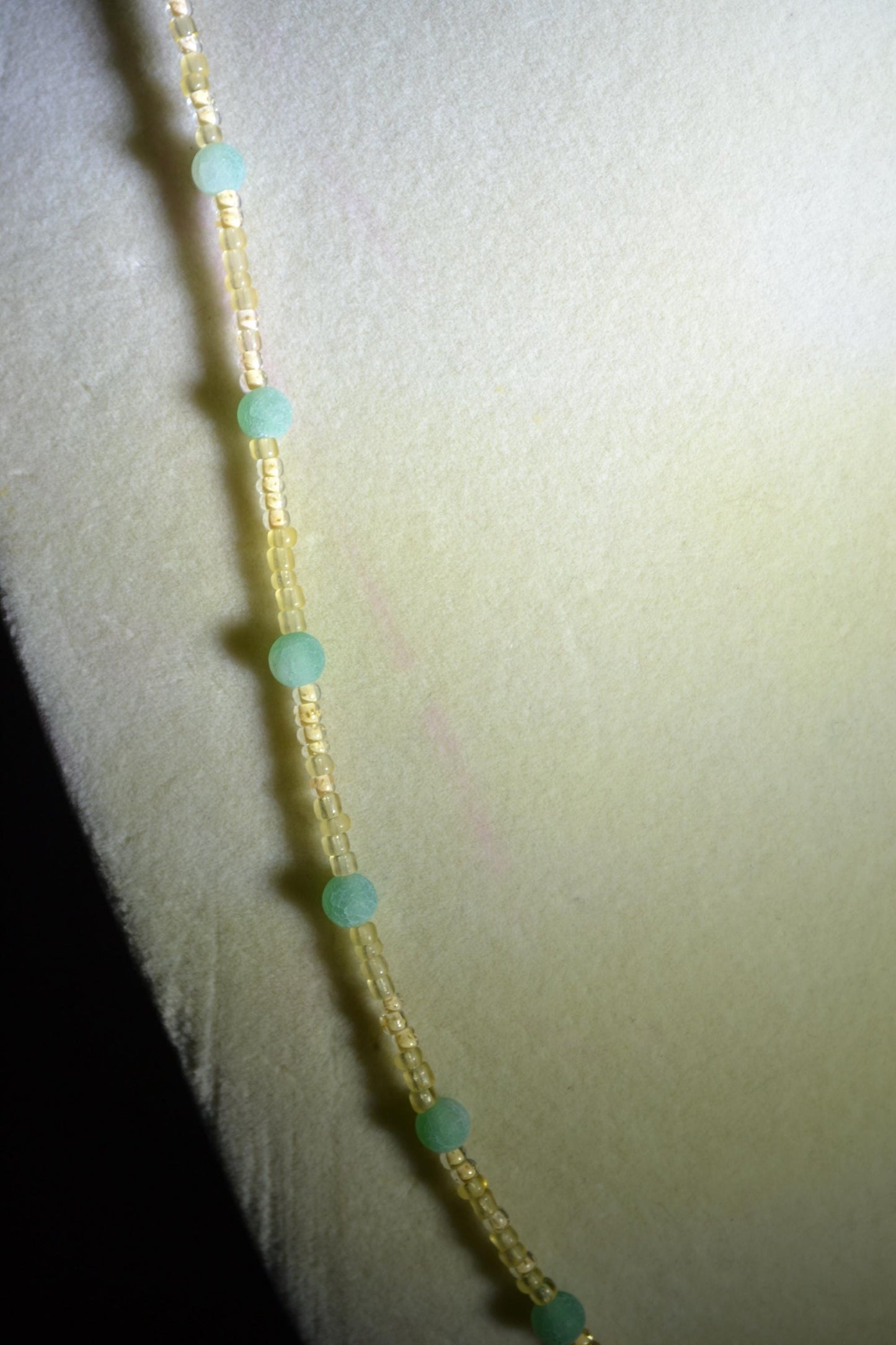 Wire wrapped sharks tooth beaded necklace. Yellow and green