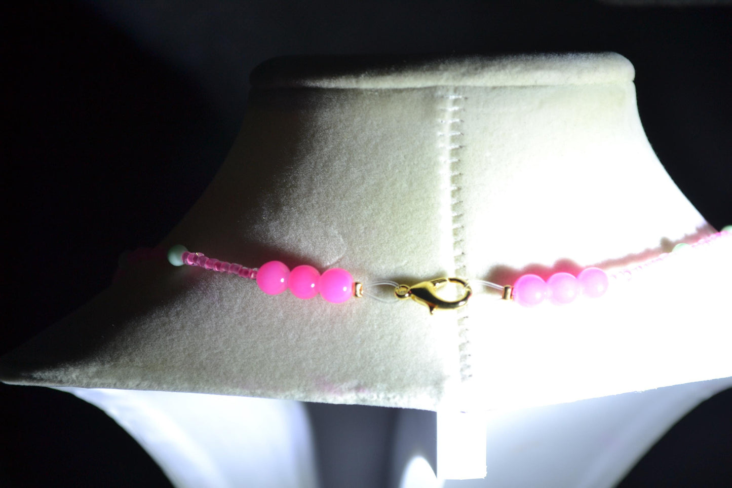 Wire wrapped sharks tooth pendant beaded necklace. Pink and green