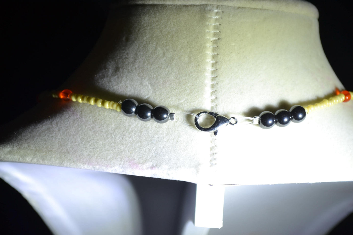 Wire wrapped sharks tooth beaded choker. Yellow and orange