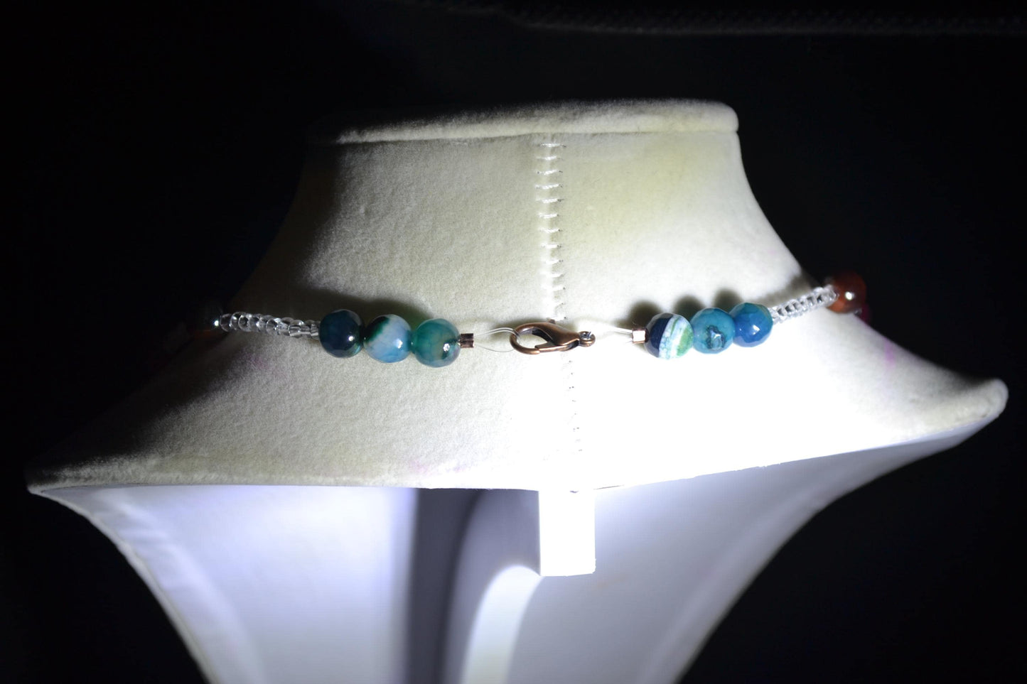 Multicolor glass bead necklace. Reds and crystal
