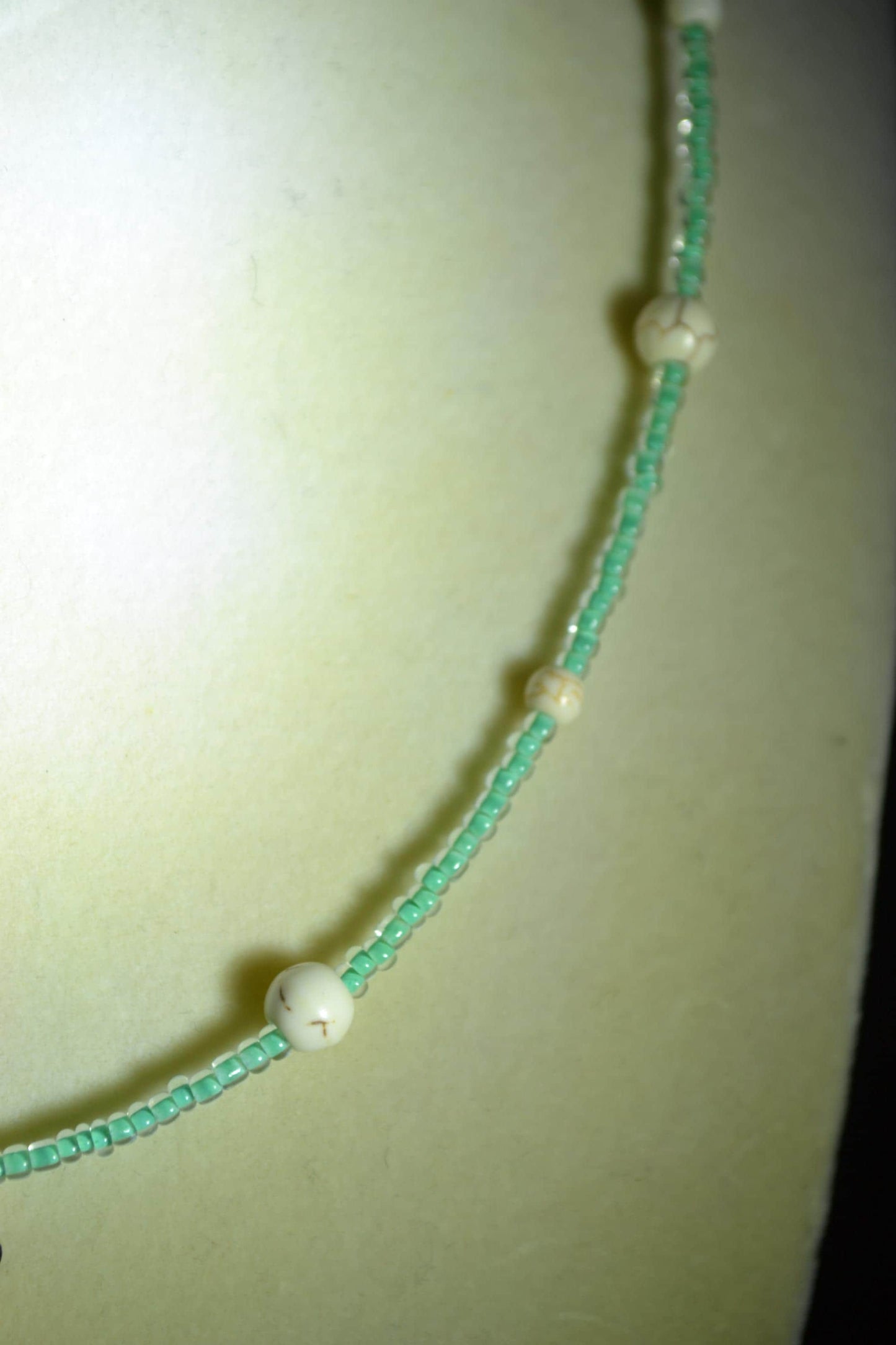 Wire wrapped sharks tooth beaded necklace. Teal and white